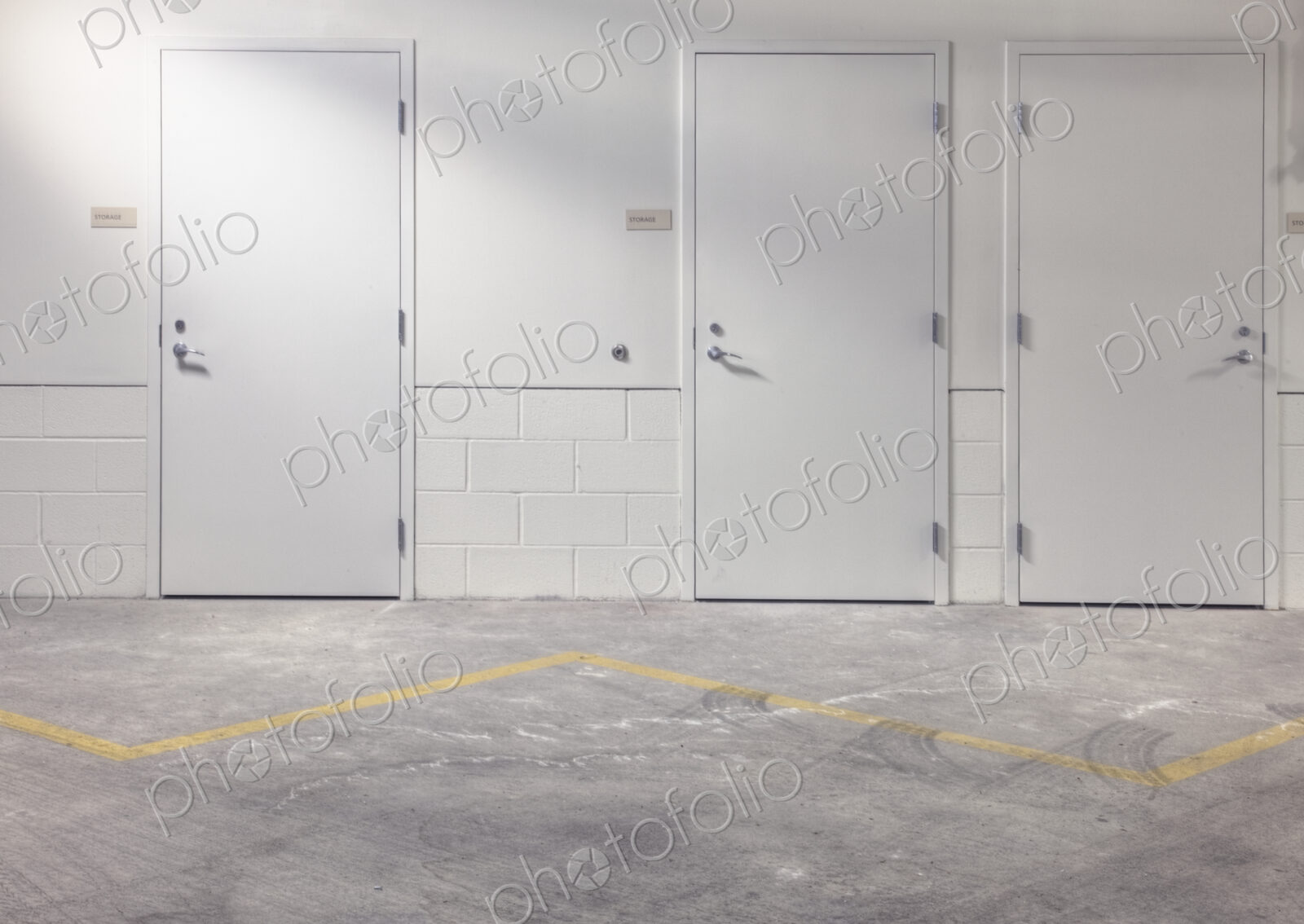 White doors in parking lot.