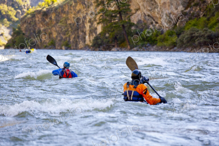 Whitewater Kayakers paddling the choppy fast flowing waters of Impassable Canyon on…