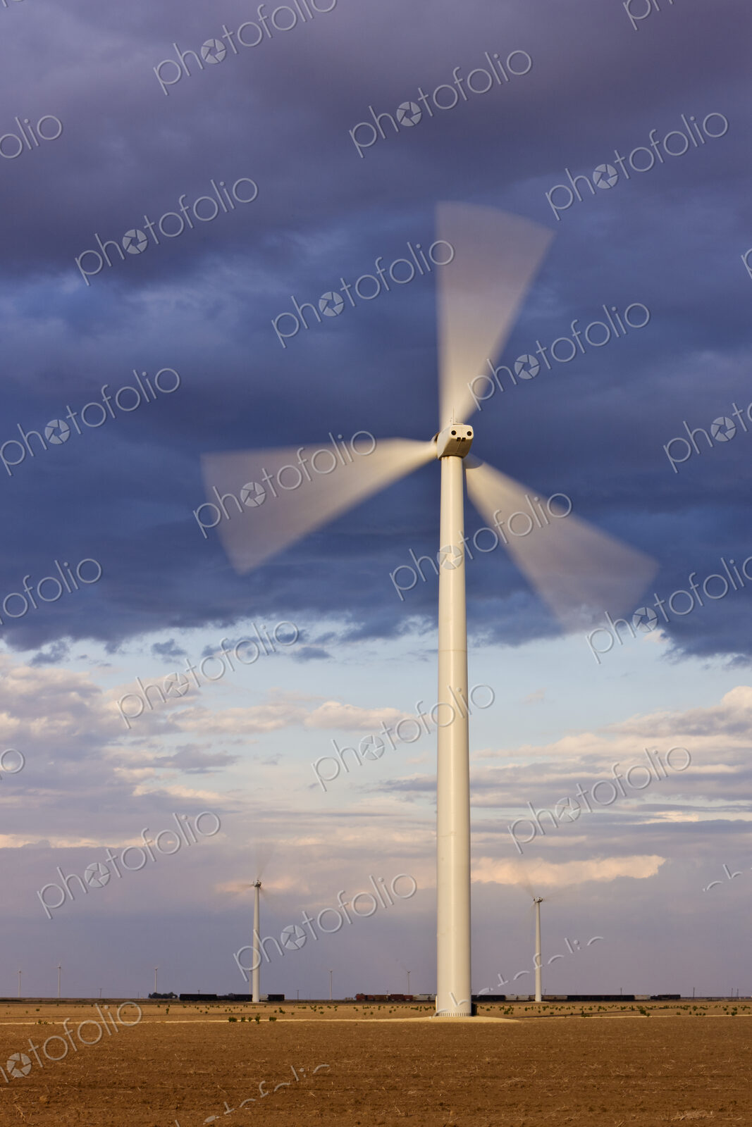 Wind Turbine Spinning at Dusk