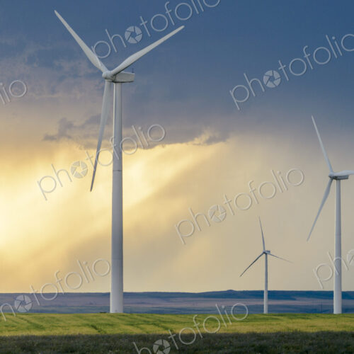 Wind turbines at sunset