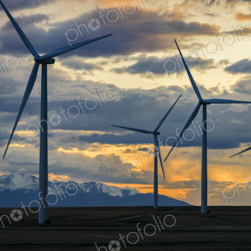 Wind turbines at sunset