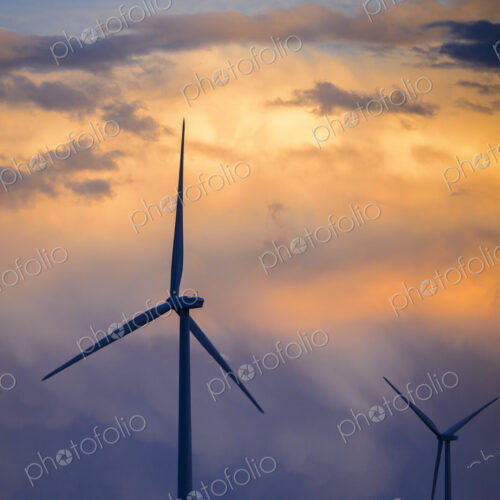 Wind turbines at sunset