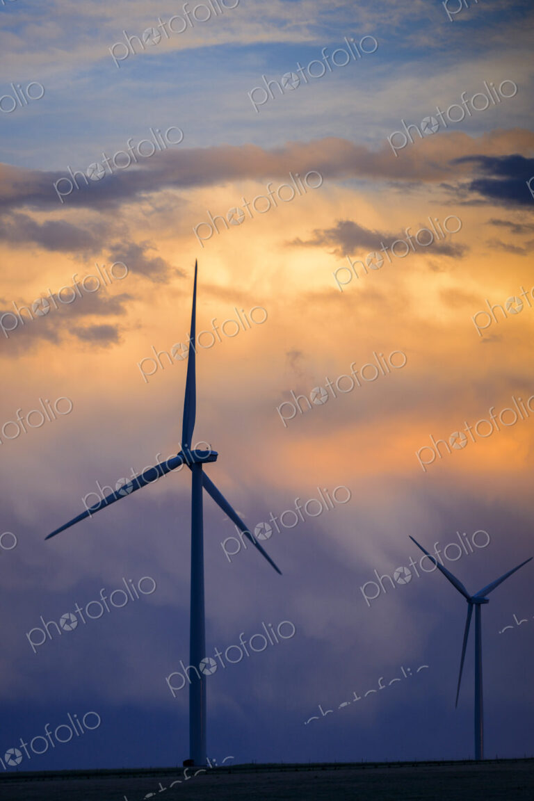 Wind turbines at sunset