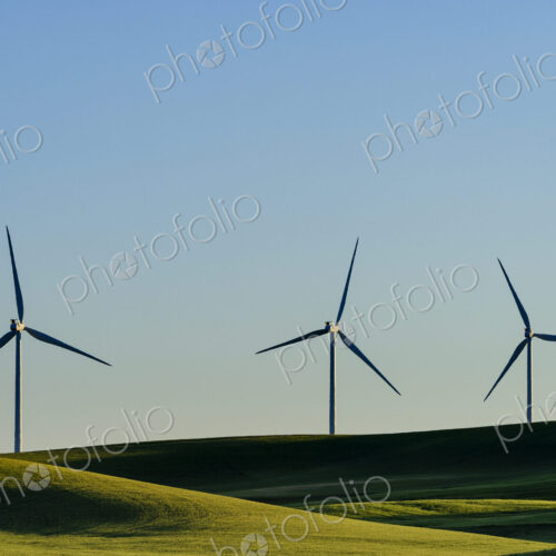 Wind turbines in green rolling landscape Wind turbines in green rolling landscape
