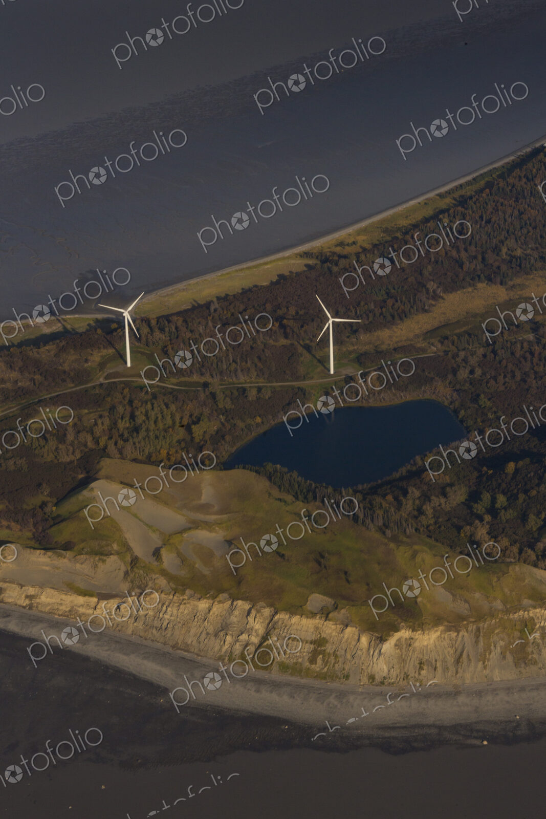 Wind turbines on Fire Island, Anchorage, an aerial view.