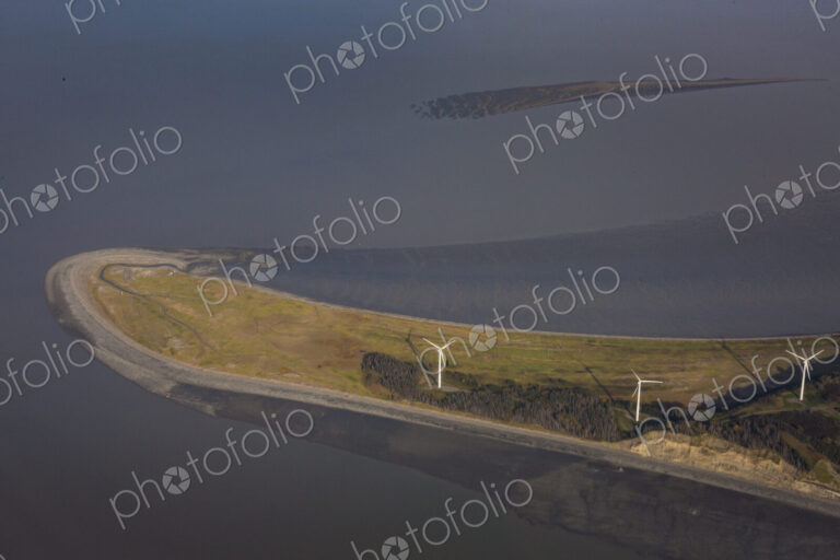 Wind turbines on Fire Island near Anchorage, an aerial view of the island, and three…