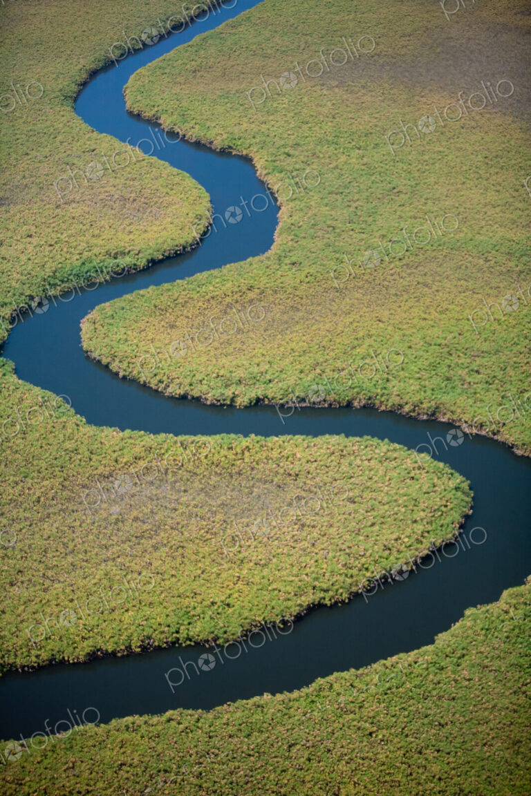Winding river course, seen from above. River bends.