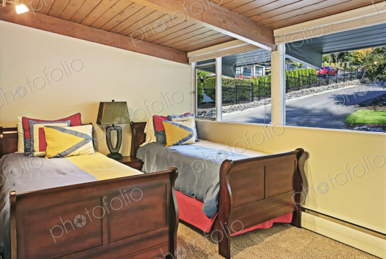 Window and beds in bedroom