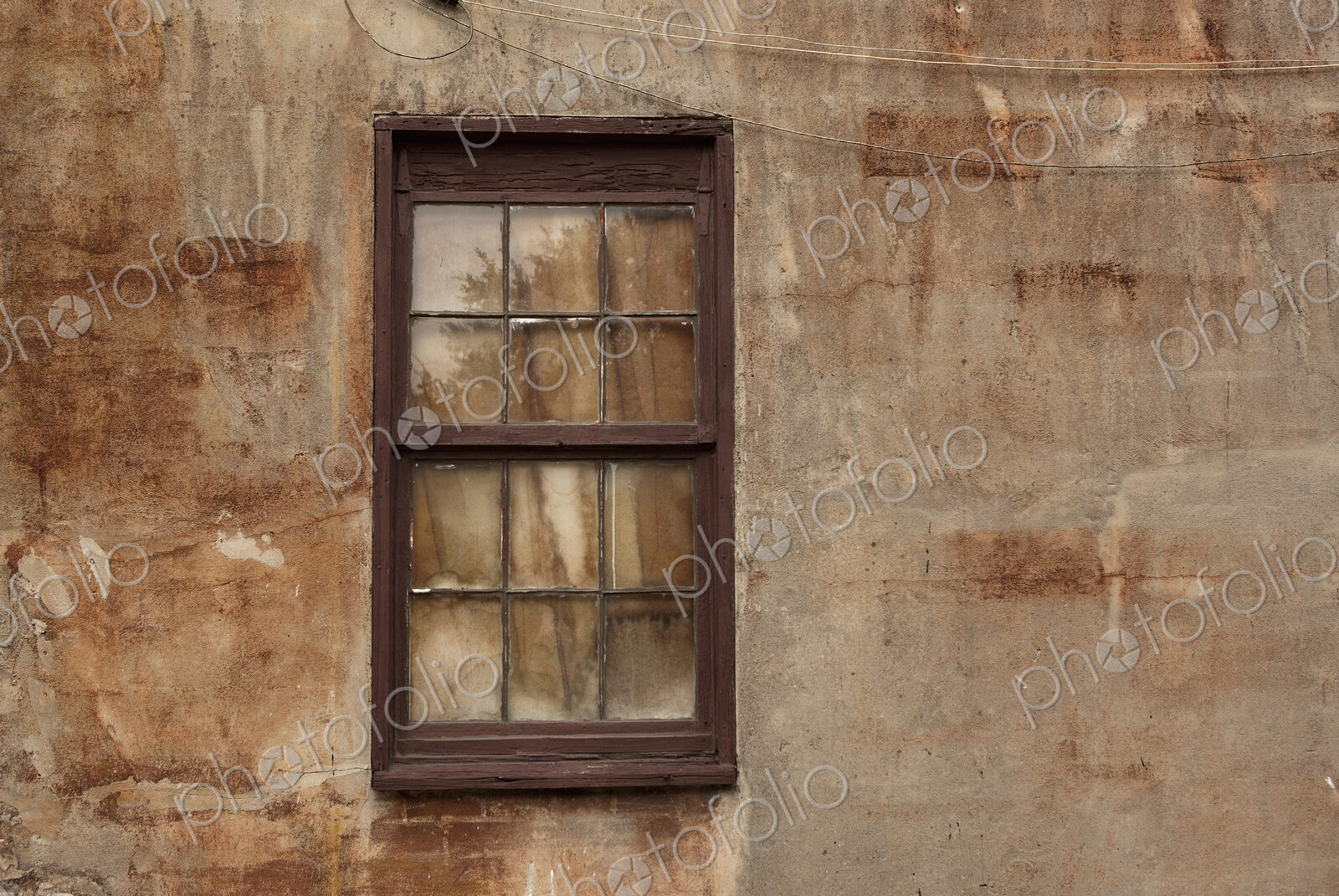 Window in Stucco Wall