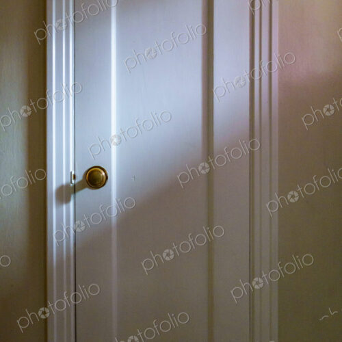 Window light on wooden interior door