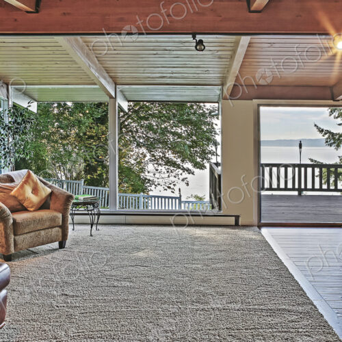 Window with lake view in living room Window with lake view in living room