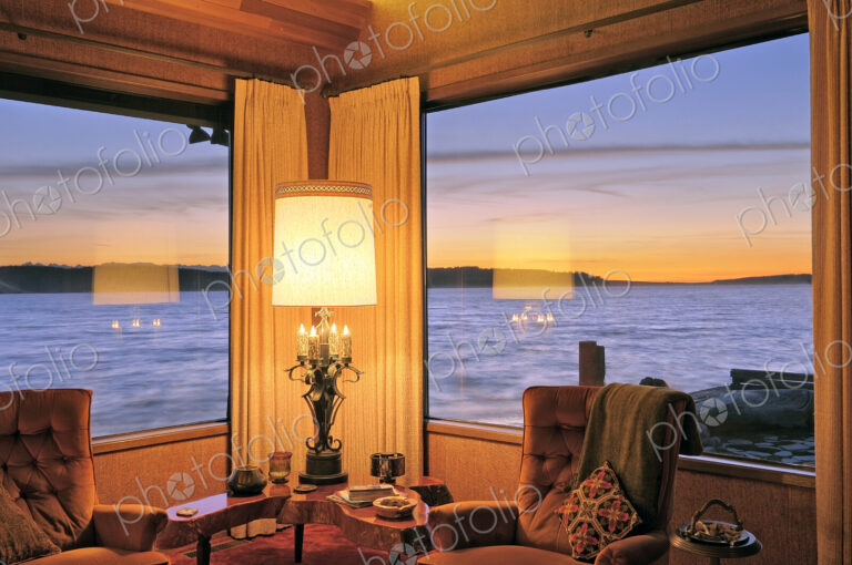 Windows in modern living room over ocean view