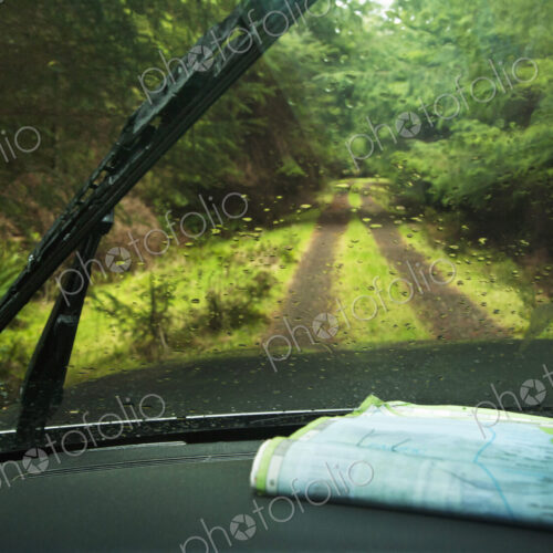 Windshield wipers and map on dashboard of car