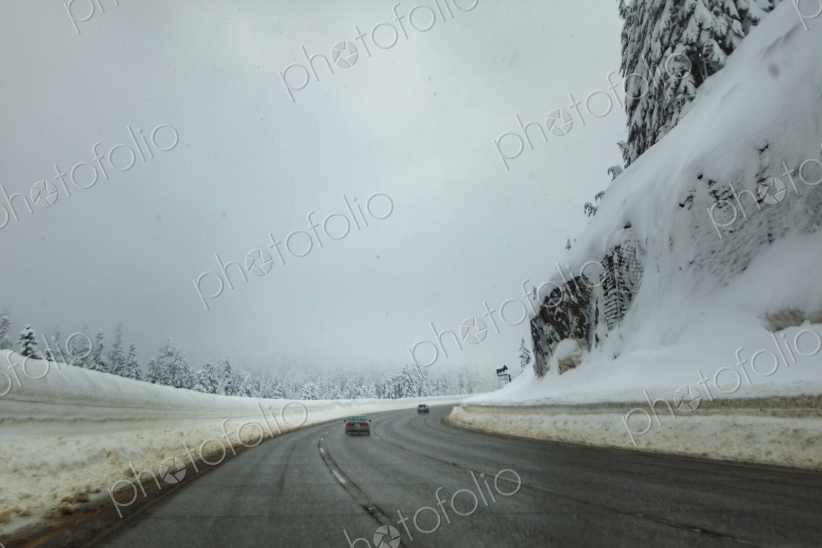 Winter driving on Interstate 90 near Snoqualmie Pass, WA USA