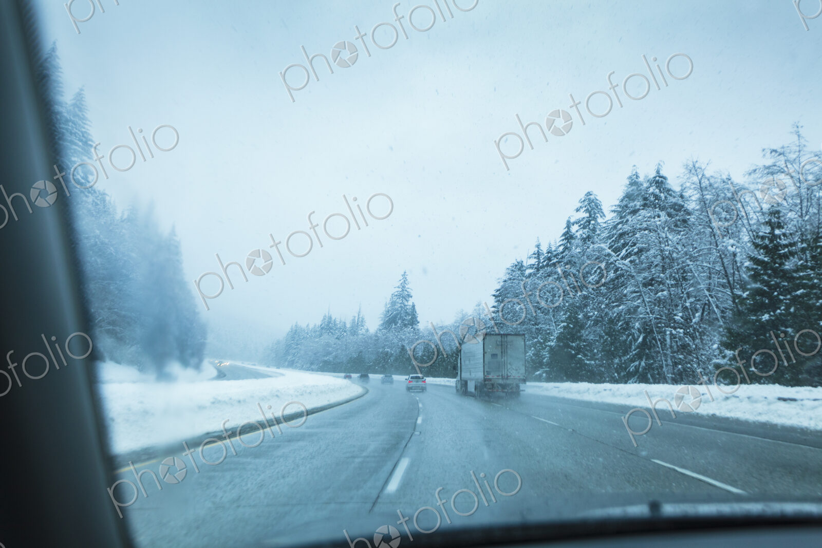 Winter driving on Interstate 90 near Snoqualmie Pass, WA USA