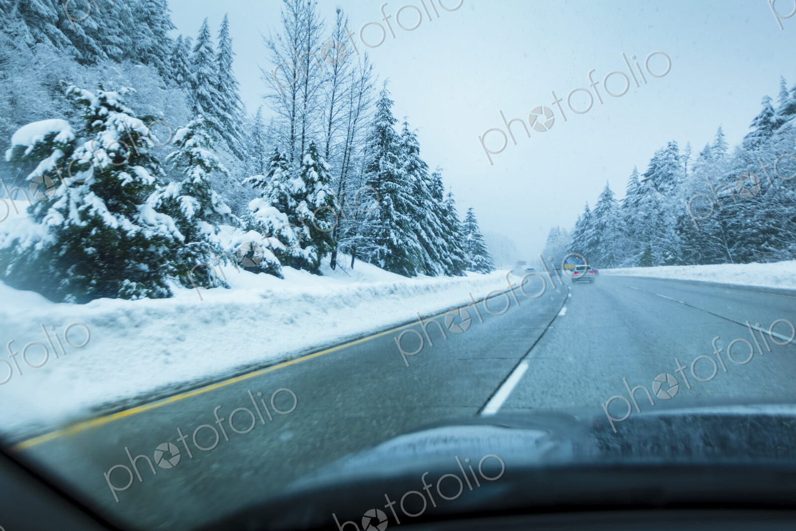 Winter driving on Interstate 90 near Snoqualmie Pass, WA USA
