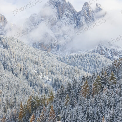 Winter landscape with church, forest and snow-capped mountains. Winter landscape with church, forest and snow-capped mountains.