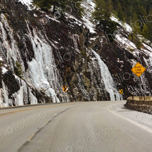 Winter on Highway 97 over Blewett Pass, cliffs and a sharp bend in the road. Winter on Highway 97 over Blewett Pass, cliffs and a sharp bend in the road.