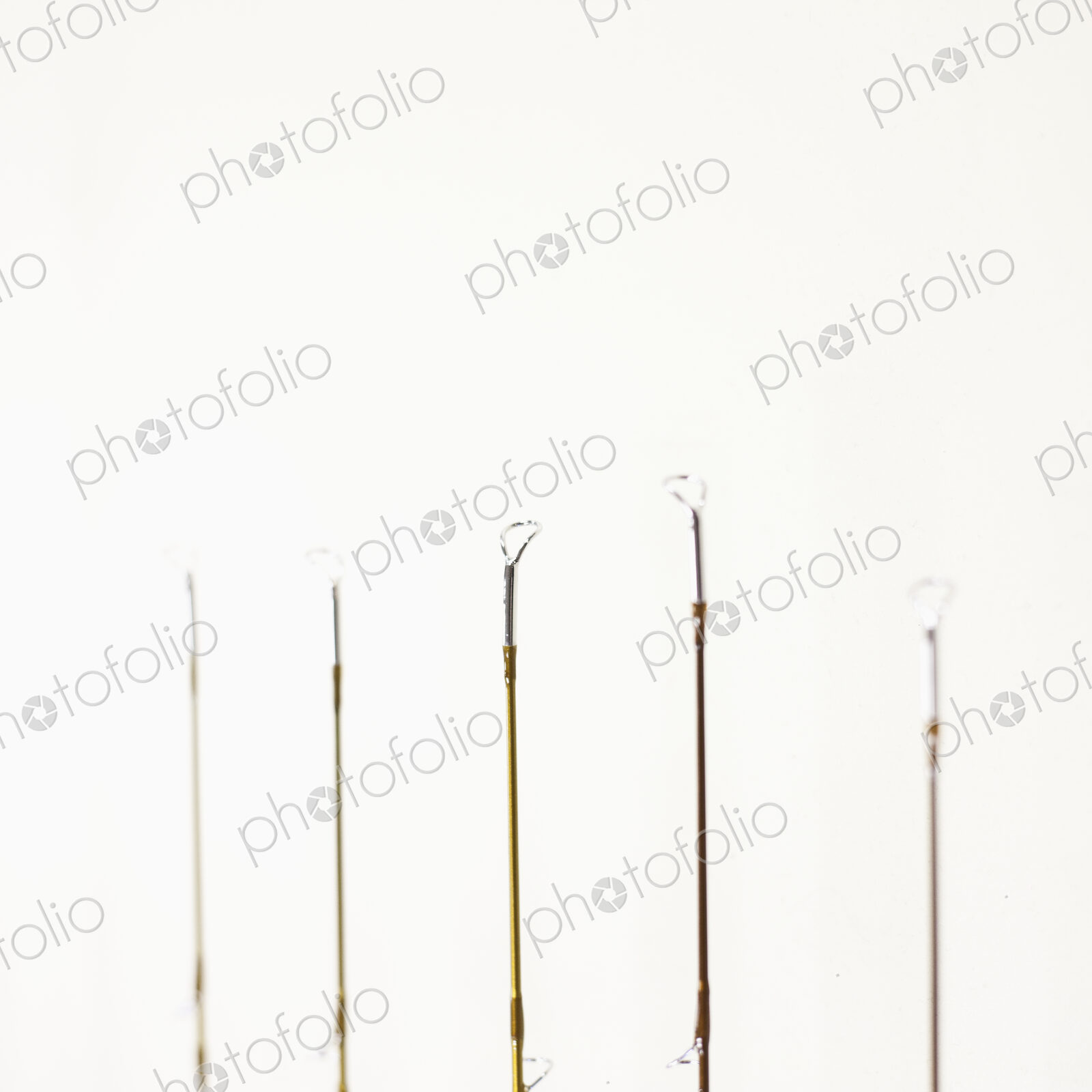 Wires or tools on white.