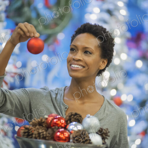 Woman at home decorating for Holidays