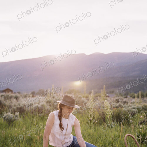 Woman having a picnic on a meadow.