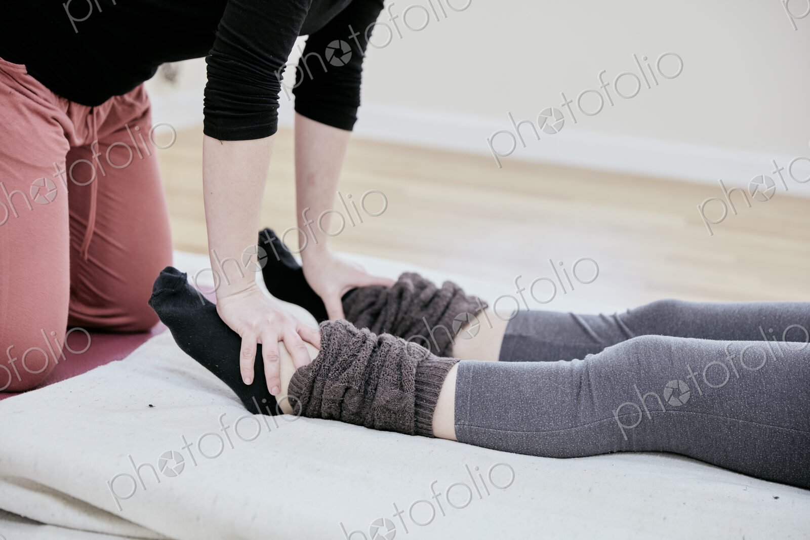 Woman receiving a Thai massage on her feet
