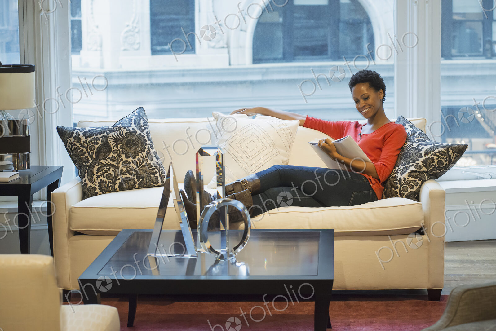 Woman relaxing at home reading