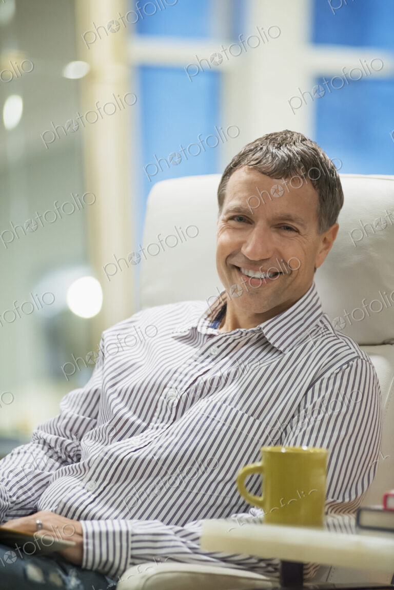 Woman relaxing at home with coffee