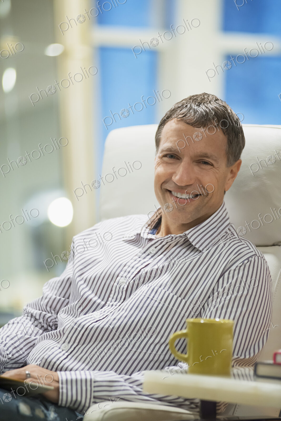 Woman relaxing at home with coffee