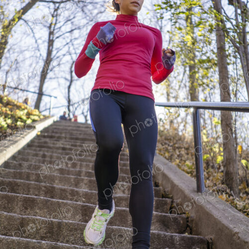 Woman running on staircase