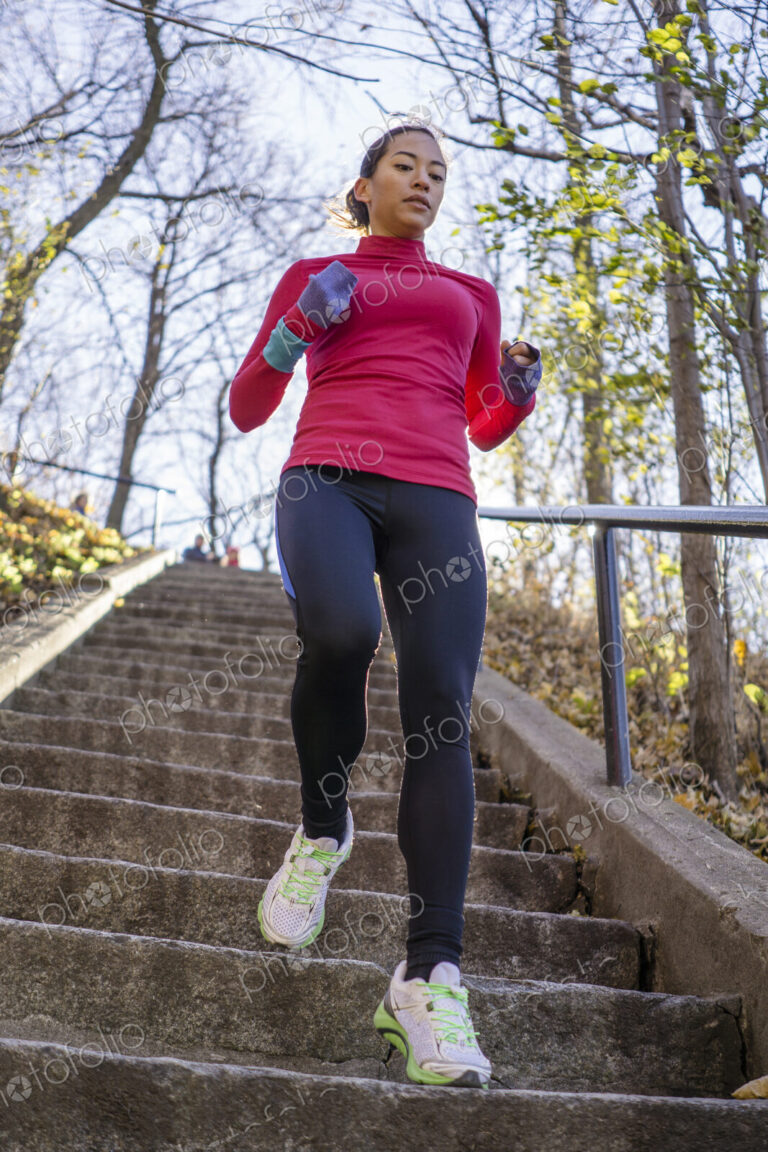 Woman running on staircase
