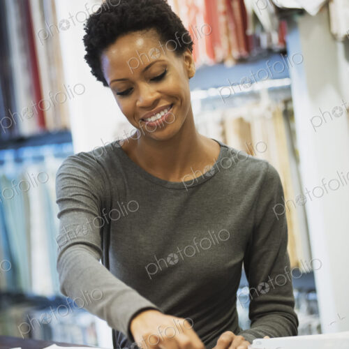 Woman working in design shop
