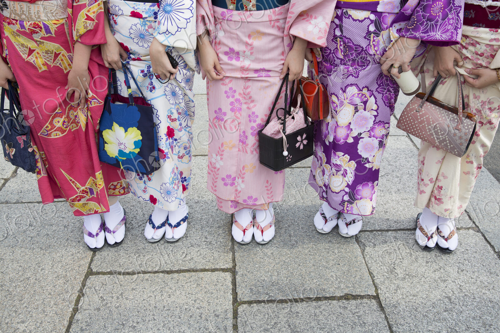 Women wearing traditional Japanese kimonos and footwear, low section
