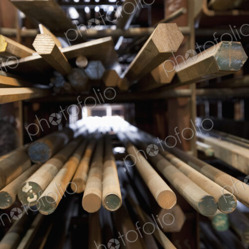 Wood Dowel Rods stacked on shelves