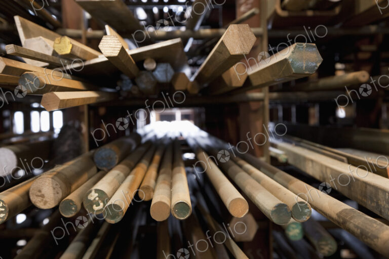 Wood Dowel Rods stacked on shelves