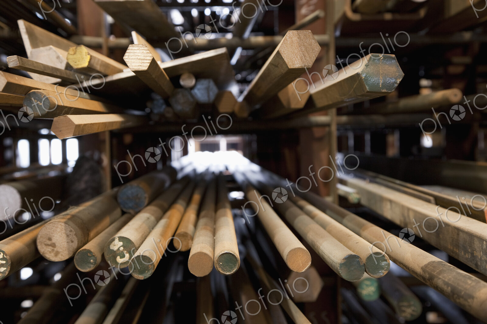 Wood Dowel Rods stacked on shelves