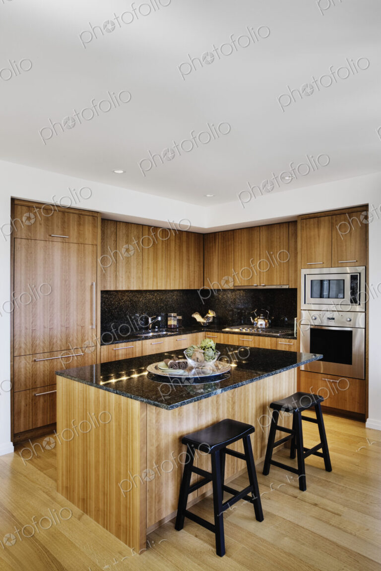 Wood cupboards in modern kitchen