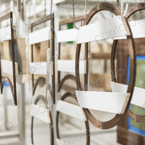 Wood parts drying in the finishing area of a large woodworking factory. Wood parts drying in the finishing area of a large woodworking factory.