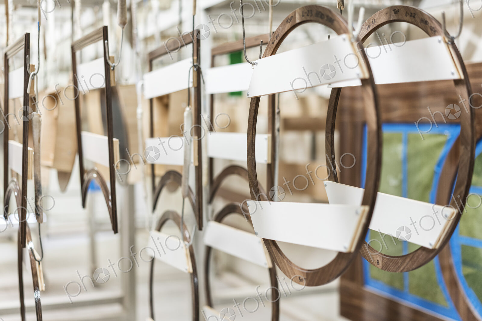 Wood parts drying in the finishing area of a large woodworking factory.