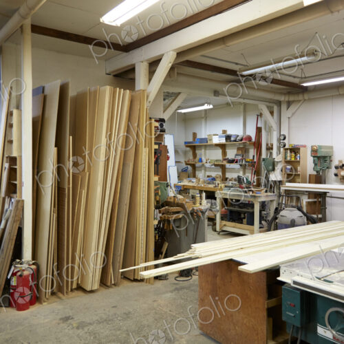 Wood, work benches and tools in workshop Wood, work benches and tools in workshop