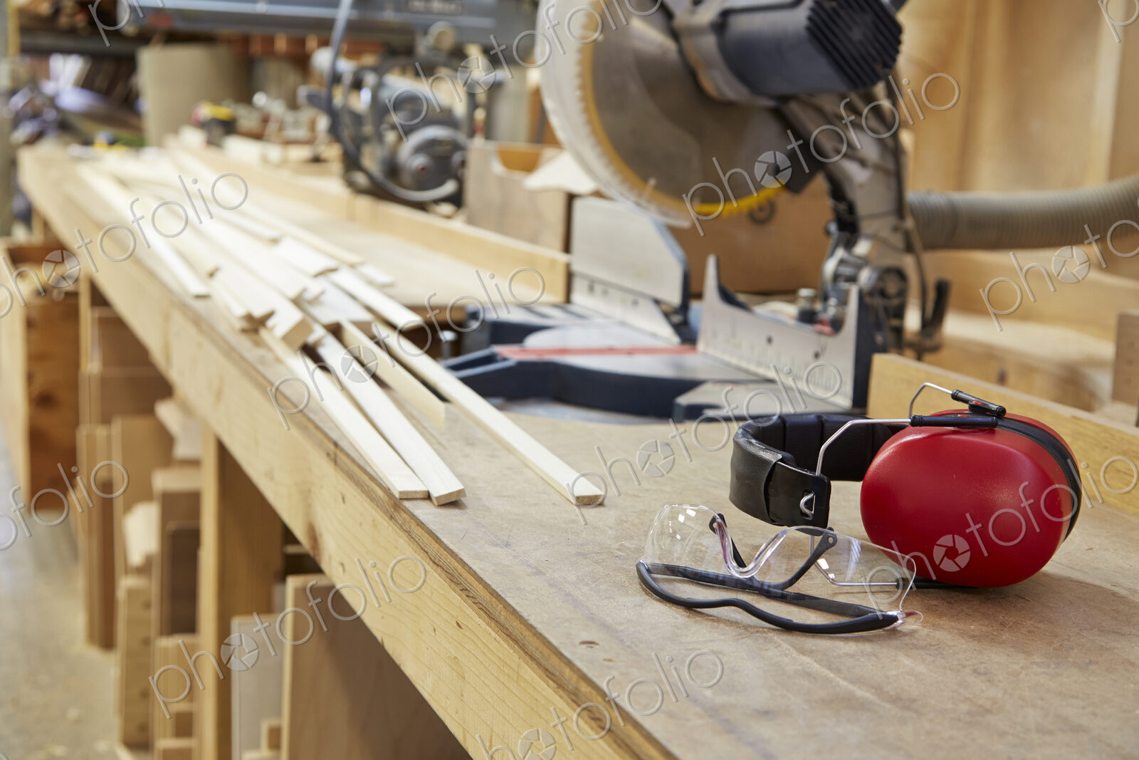 Wood, workbenches and tools in workshop