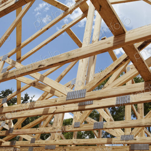 Wooden Beams Across an Unfinished Home Wooden Beams Across an Unfinished Home