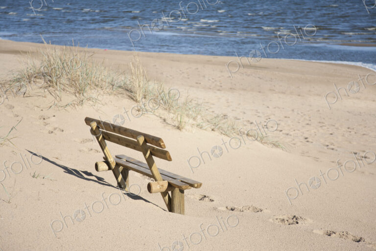 Wooden Bench on the Beach