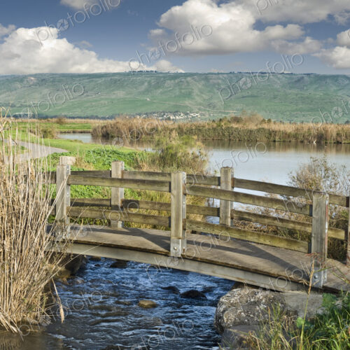 Wooden Bridge Over A Stream Wooden Bridge Over A Stream