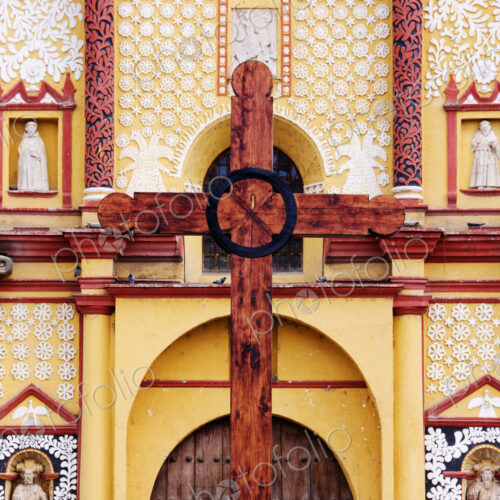 Wooden Cross in Front of Church Wooden Cross in Front of Church
