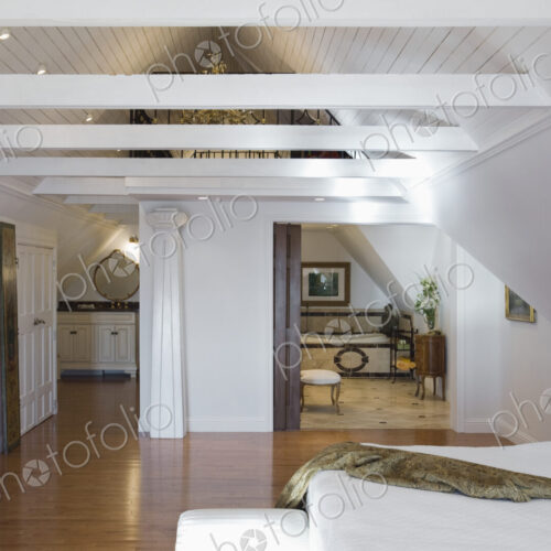 Wooden beams in master bedroom