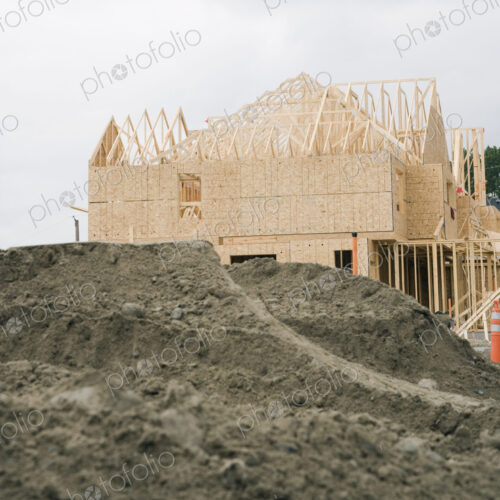 Wooden building frame on construction site. Wooden building frame on construction site.