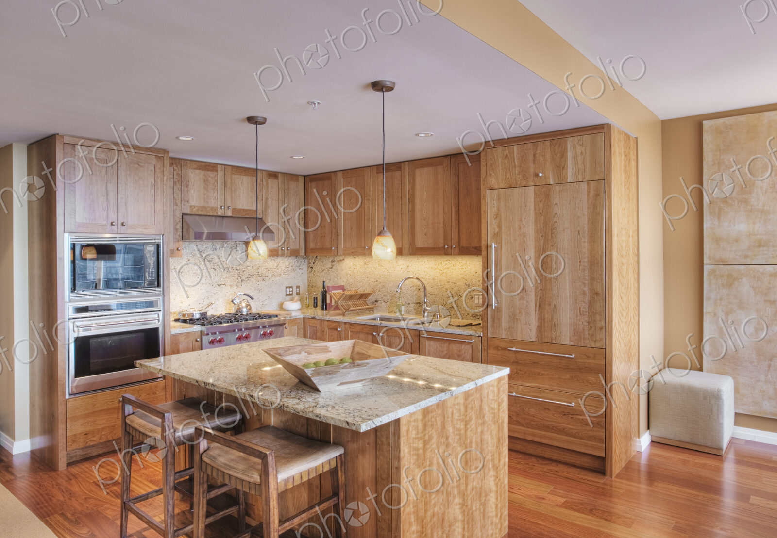 Wooden cupboards in luxury kitchen
