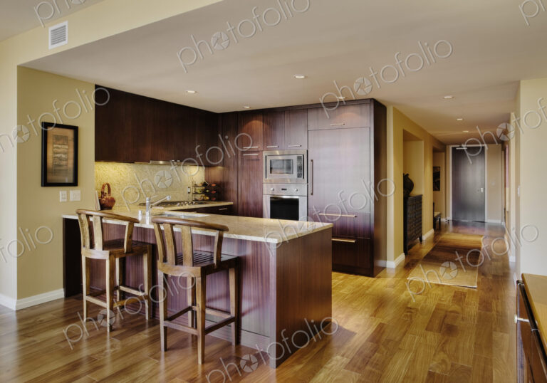 Wooden cupboards in modern kitchen