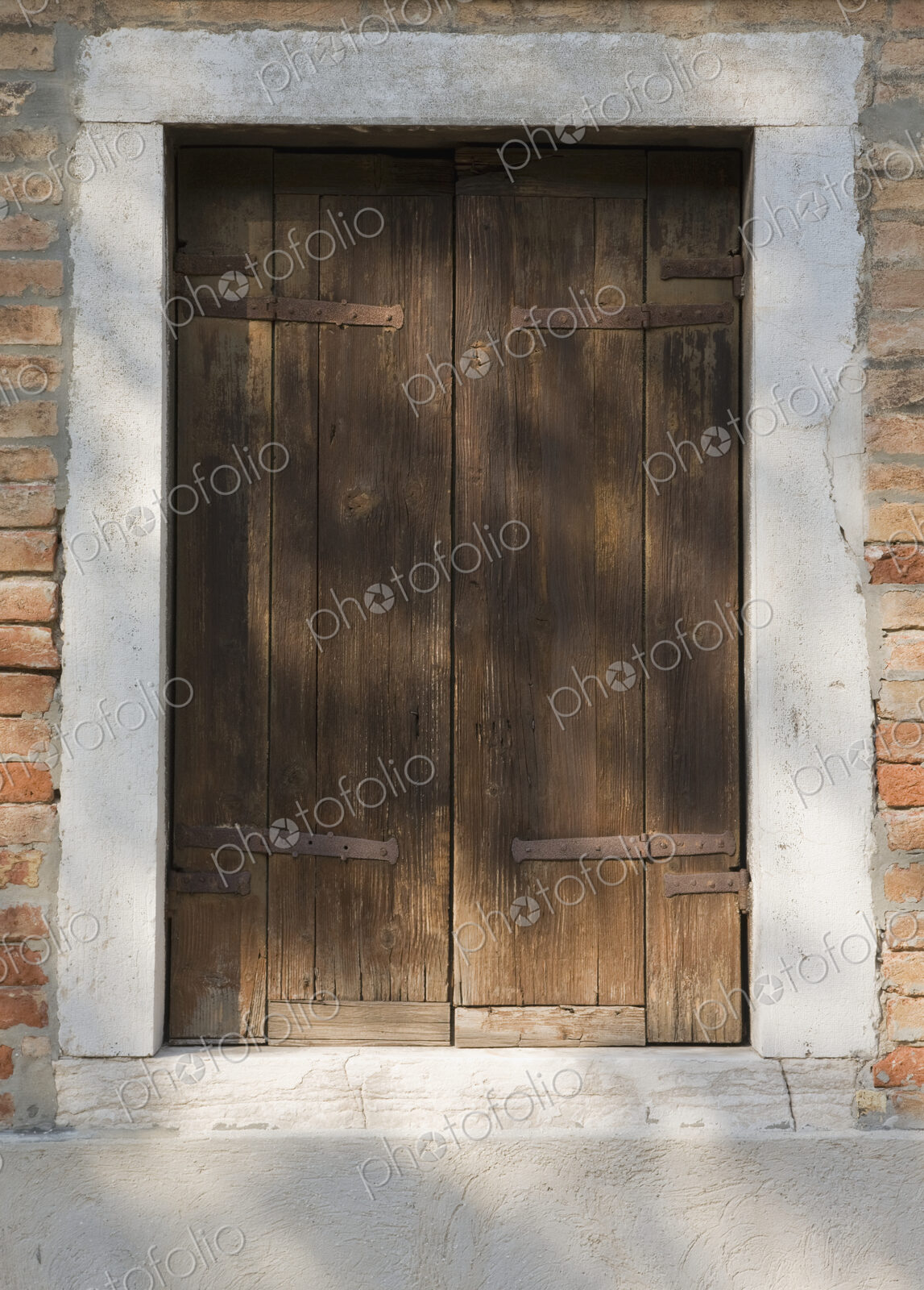 Wooden door in brick building.